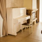 old white upright piano