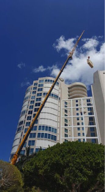 lifting a grand piano by crane