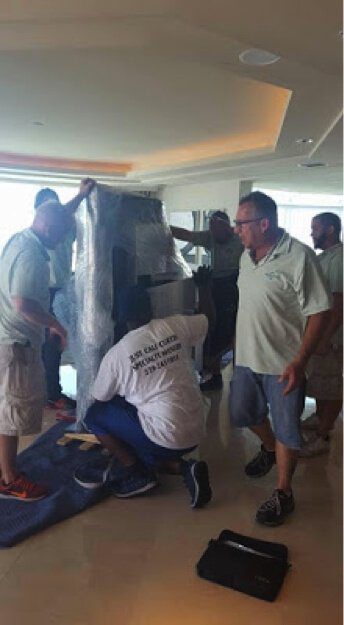 Uncrating grand piano