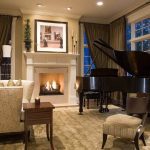 living room with a grand piano in a corner