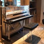 Haessler transparent acrylic upright piano
