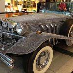 vintage Duesenberg roadster covered in crystals